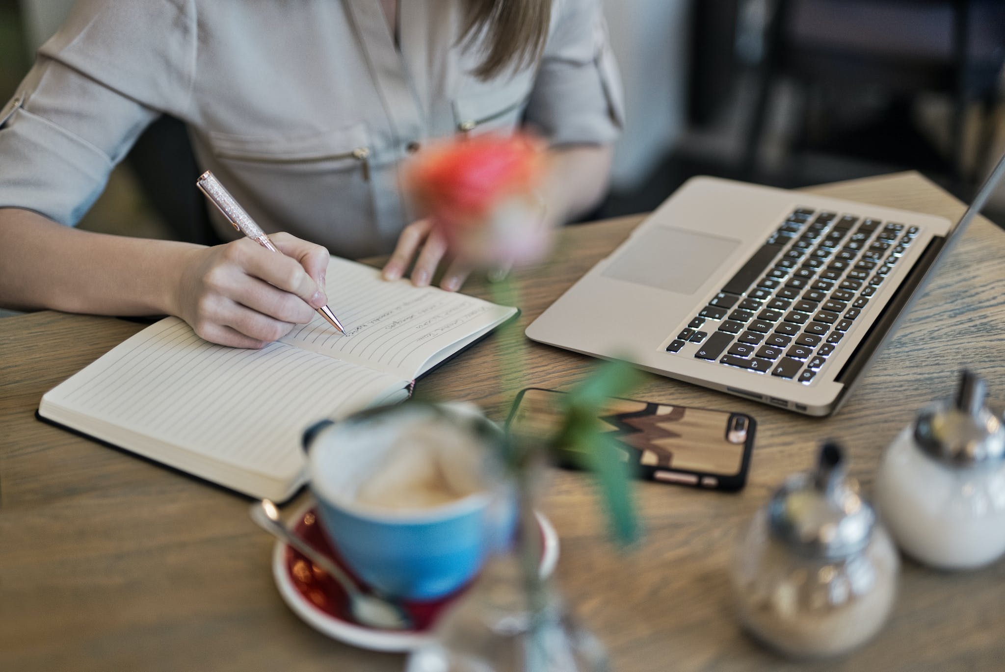Accountant reviewing financial figures on a laptop in a modern office