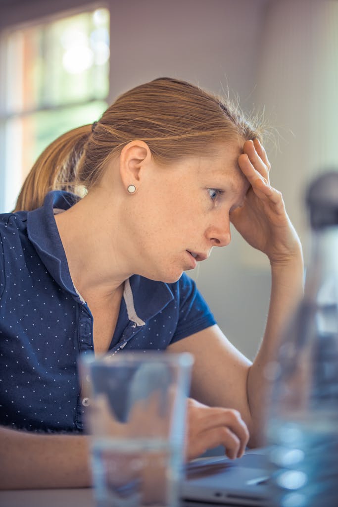 Freelancer working on a laptop calculating their day rate